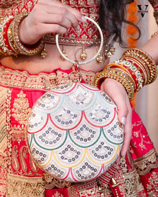 Noorani_Round_Embroidered_Mirror_Clutch_with_Bangle_Handle